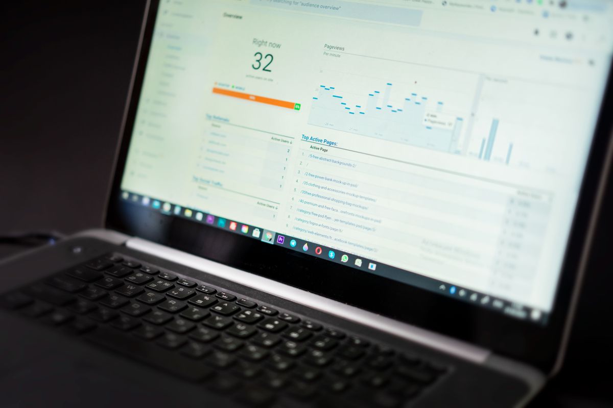 Business analytics being reviewed on a laptop