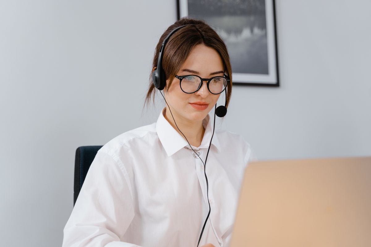 Customer support professional wearing a headset